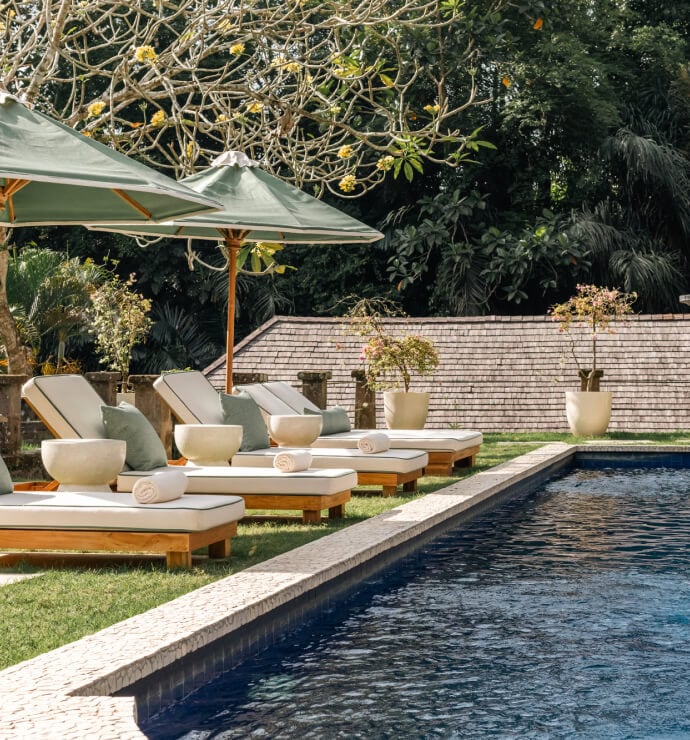 Sukhavati Ayurvedic Retreat infinity pool surrounded by tropical gardens, Bali