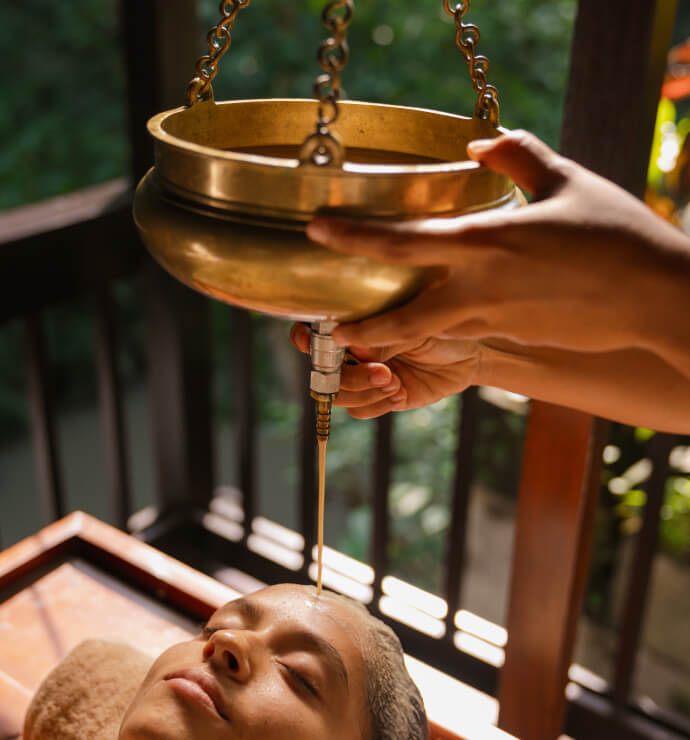 Sukhavati Ayurvedic Retreat Shirodhara treatment — traditional Ayurvedic spa therapy, Bali