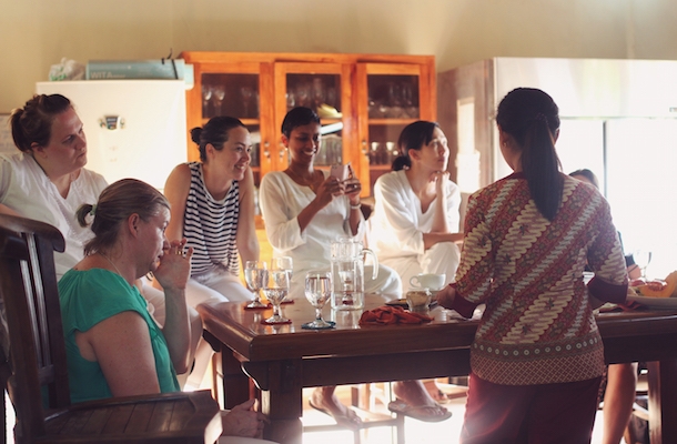 Intuitive Wellness Retreat guests around a table
