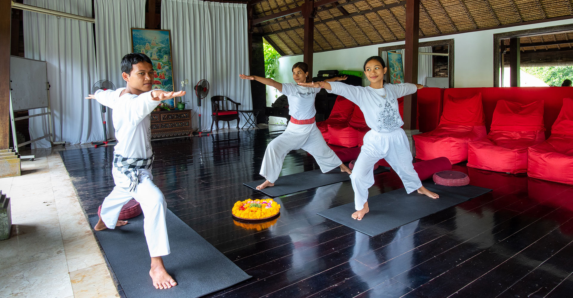 A private yoga class for two at Sukhavati Ayurvedic Wellness Retreat in Bali as part of our luxury programs.