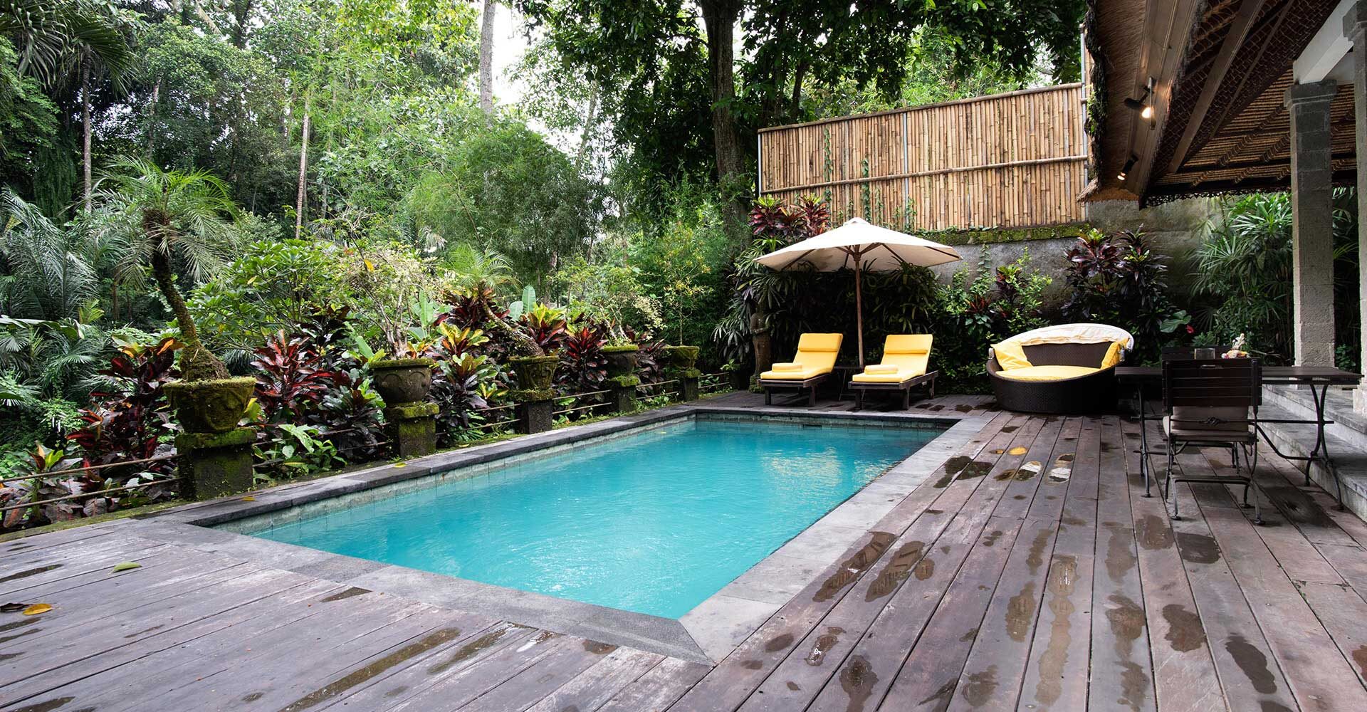 Large pool and outdoor decking area in one of Sukavati's luxury private villas.